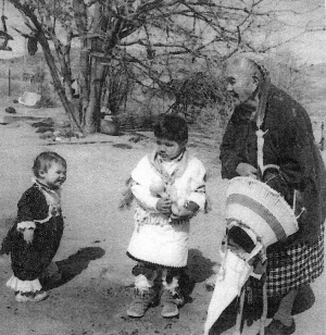 Esther Martinez with  her grandaughter, Celeste, and Jordon Agoyo teaching traditional lifeways. Credit: Josephine Binford